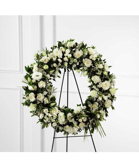 White wreath arranged by a florist in East Greenwich, RI : Busy